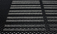Entrance grids and matting systems are assembled from modules into ready-made large mats for entrances
