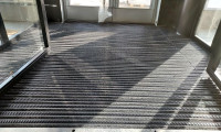 Venture entrance grid matting system installed at office building entrance