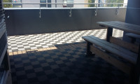 Wet area mats Modena installed on a balcony terrace
