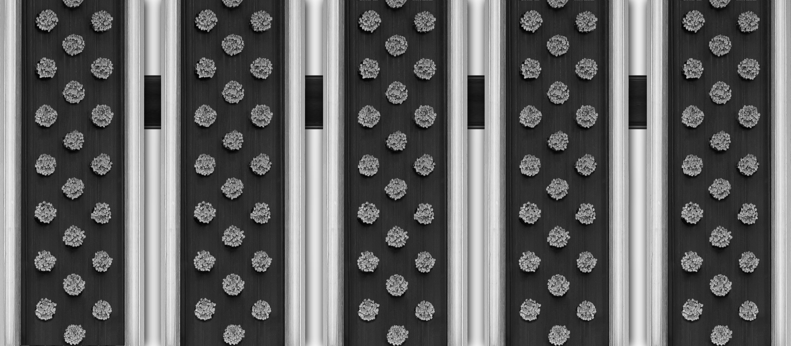 Top view of Venture Brush entrance grid showing grey cleaning brushes and aluminium profiles